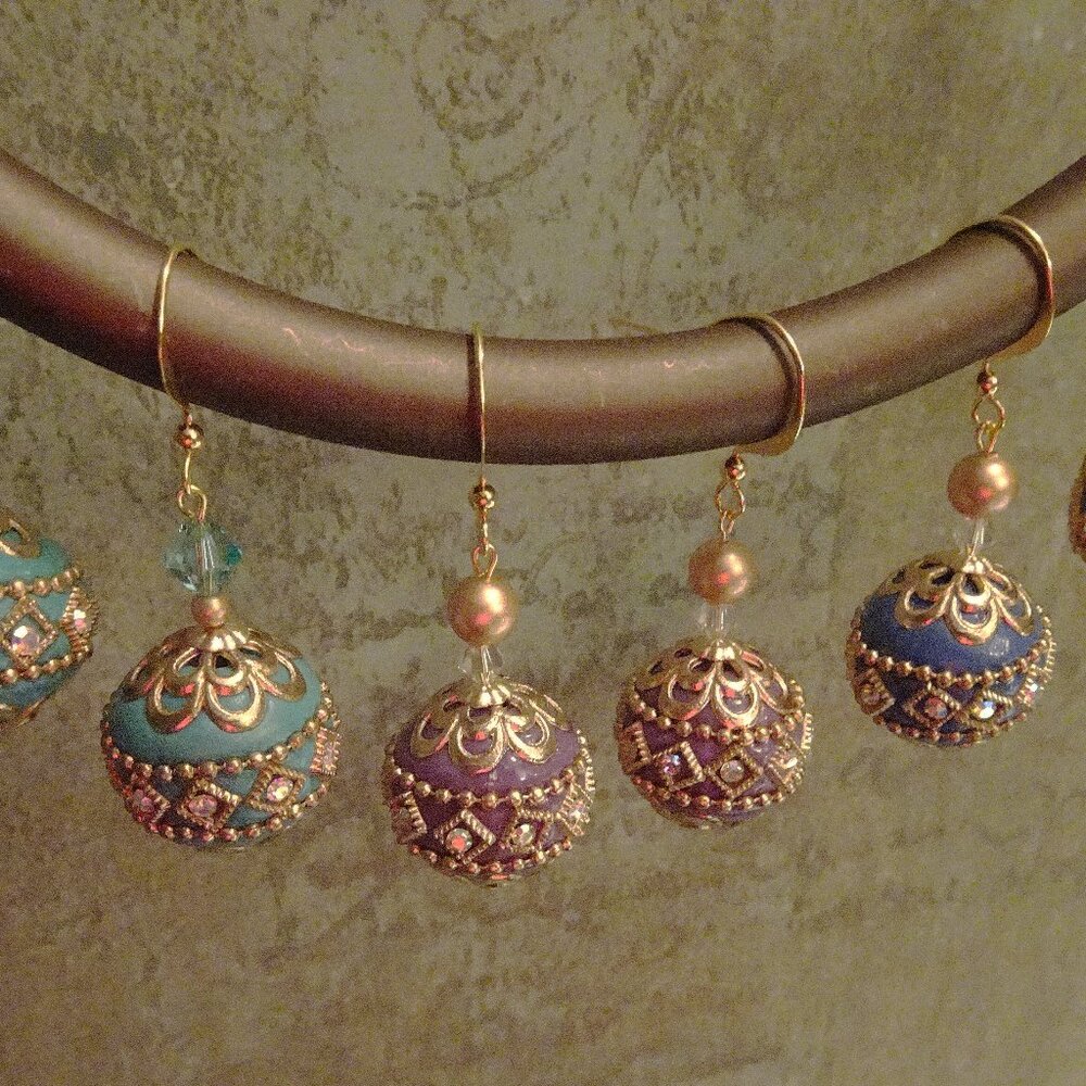 Festive earrings from 19 mm. spheres in three circus colors